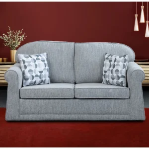 Grey Detroit 2 Seater Sofa Bed in a modern living room setting with decorative cushions.