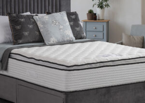 Apley Morgan 1000 Tencel Pillowtop Mattress with a quilted finish and Tencel fabric, displayed on a bed with decorative pillows in a stylish bedroom.