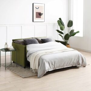 Image of stunning olive green sofa bed which opened up as a small double bed. The sofa bed is shown in a light airy living room wich also has a lamp and and a plants as room decor