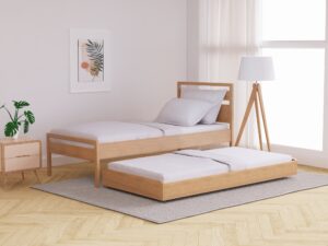 Skandi Mid Century Guest Bed with a pull-out trundle in a bright, minimalistic bedroom setting.