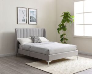 This image shows a king-size Avery bed from Apleybeds.co.uk. The bed is made of solid wood and has a classic and timeless design. The headboard is tall and has a curved top. The bed is upholstered in a luxurious soft grey faux wool fabric.