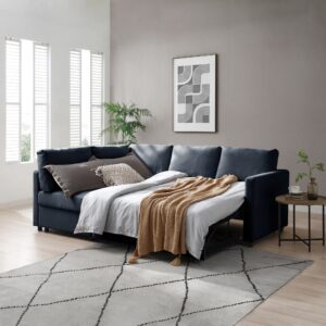 Versatile Clara Sofa Bed in Navy with Easy Clean feature, transformed into a comfortable bed with white linens and cozy throws, perfect for modern homes. Shop now at www.apleybeds.co.uk for space-saving furniture solutions.