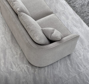 Top view of the plush Rubin Corner Sofa in Pebble Bouclé showcasing its textured fabric and comfortable pillows.