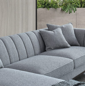 Detailed view of the Cooper sofa's seating in Dolphin Bouclé.
