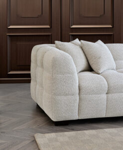 Close-up of the Tribeca Corner Sofa in Oatmeal Bouclé fabric, highlighting its intricate stitching and plush cushions