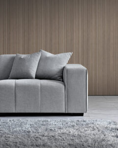 Close-up view of the Leonard sofa's corner section in cloudy grey bouclé fabric.
