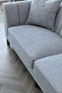 Cushion detail on the Cooper 3 Seater Sofa in Dolphin Boucle