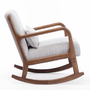 Inca Rocking Chair with natural wood frame and cushioned seat in a contemporary living room.