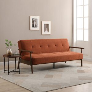 A modern, burnt orange Berkley sofa bed in a stylish living room setting.