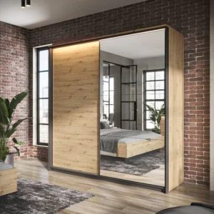 Quant mirrored wardrobe in a modern bedroom setting, featuring a combination of wood and black framing.