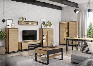 Modern living room furnished with the Quant furniture collection, featuring a TV cabinet, wall shelf, coffee table, and storage units in Oak Artisan and Black finishes.