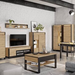 Modern living room furnished with the Quant furniture collection, featuring a TV cabinet, wall shelf, coffee table, and storage units in Oak Artisan and Black finishes.