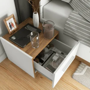 Dentro Bedside Cabinet in White Matt & Oak Sterling with an open drawer revealing neatly stored essentials.