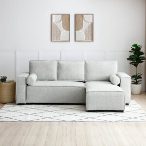 Harrison Corner Sofa Bed in grey boucle fabric with cushions, styled in a minimalist modern living room.