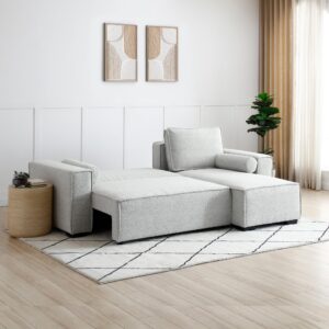 Harrison Corner Sofa Bed extended into a bed position with cushions removed, set in a bright room with modern decor.