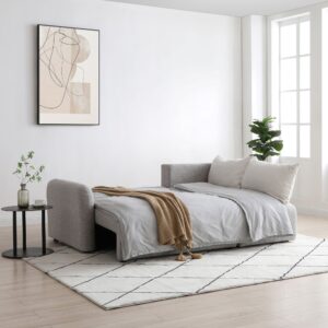 Cloud Corner Sofa Bed fully extended into a bed position, dressed in light bedding with warm accents in a modern living space.