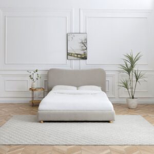 Mollie bed in a box styled in a bright Scandi bedroom with white bedding and natural decor