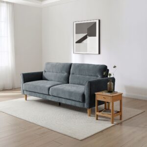 Harvey Sofa Bed in Venus Denim chenille in a living room with a side table