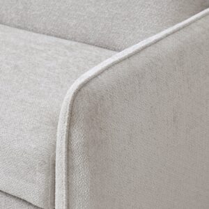 Close-up of the piped arm and chenille weave on the Millie Sofa Bed in natural