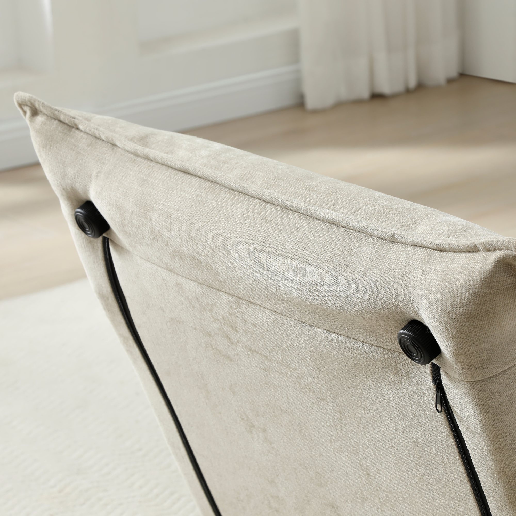 Close-up of the side strap and folding mechanism on the Carter Sofa Bed