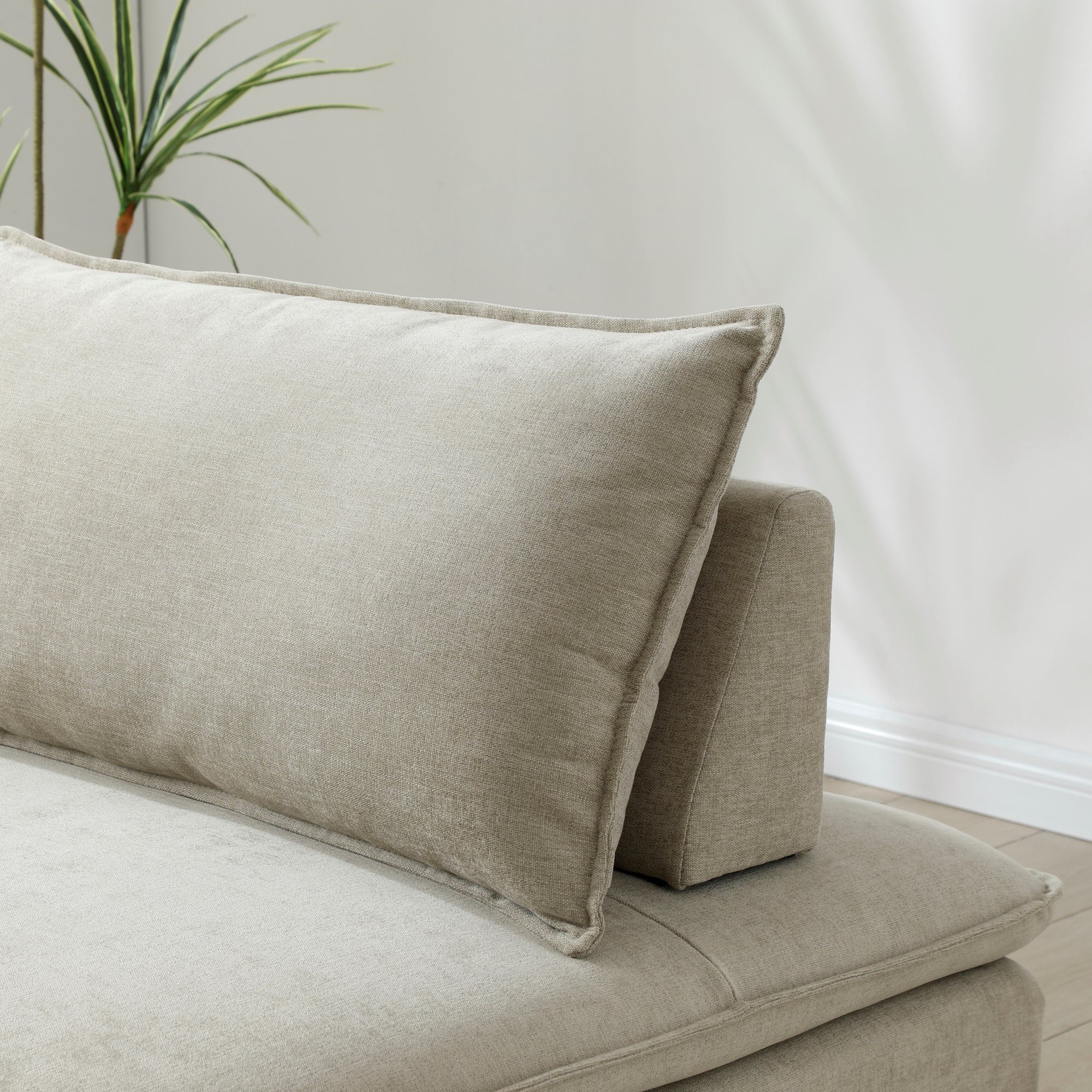 Close-up of the back cushion and chenille weave on the Rhodes Single Seat Sofa Bed in taupe