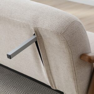 Close-up of the metal click-clack strut under the Zara Rattan Arm Sofa Bed