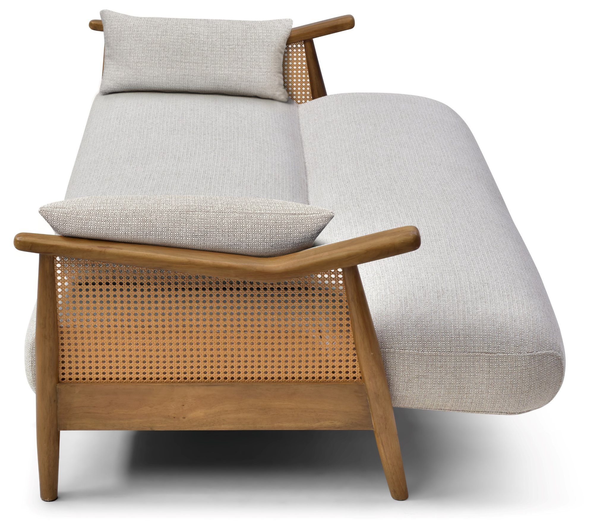Zara Rattan Arm Sofa Bed from the side with the back folded flat into a bed