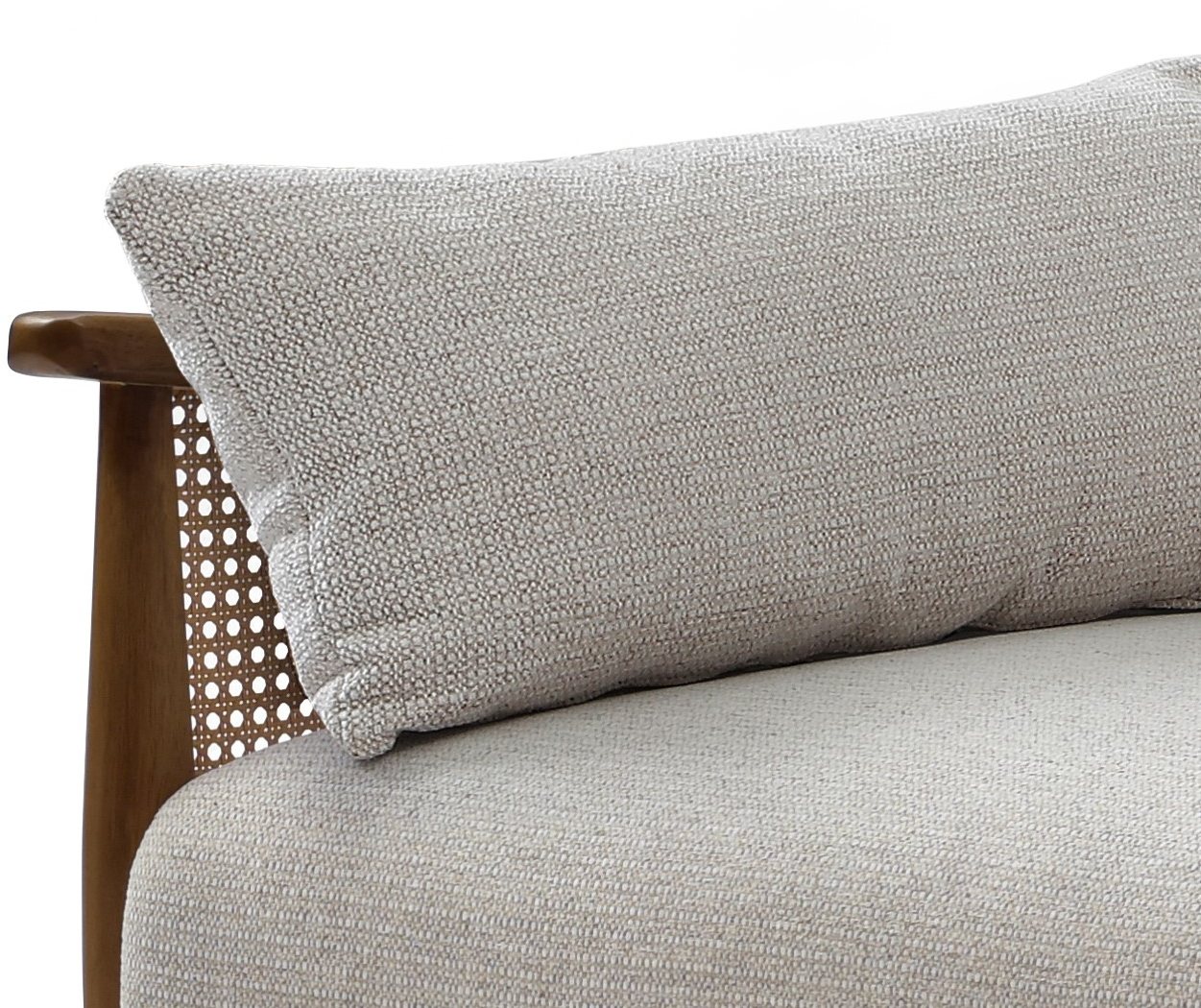 Close-up of the seat cushion against the natural cane rattan arm on the Zara Sofa Bed