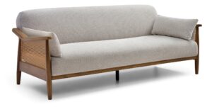 Zara Rattan Arm Sofa Bed viewed from the front, showing the exposed wooden frame and legs
