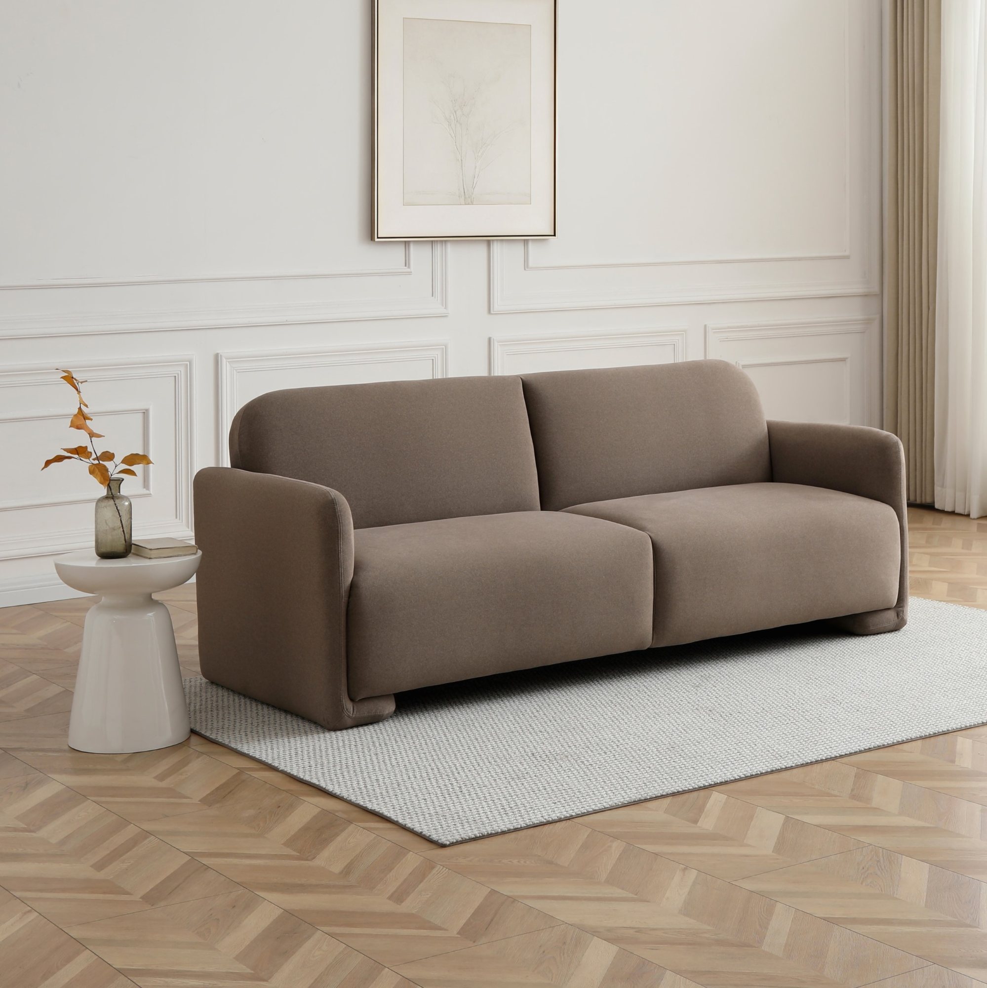 Murphy velvet sofa bed in Mohair Taupe on a low plinth base, in a panelled living room