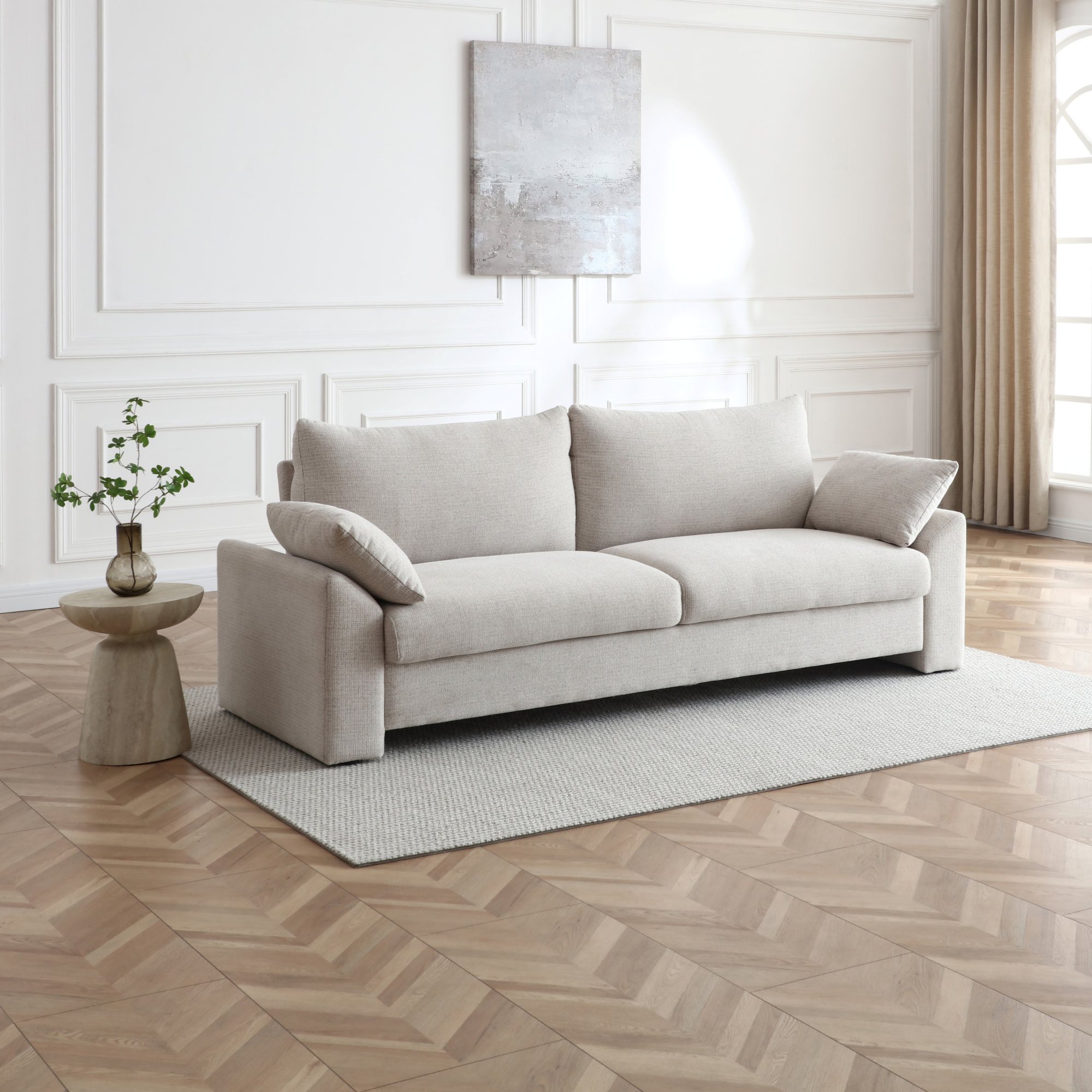 Evelyn Sofa Bed in a living room with a side table and herringbone flooring