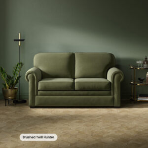 Jay-Be Heritage 2 seater sofa bed in Brushed Twill Hunter green, shown in a living room