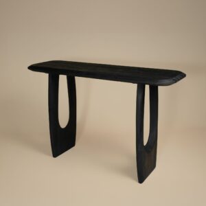 Casey console table shown against a wall in a hallway setting