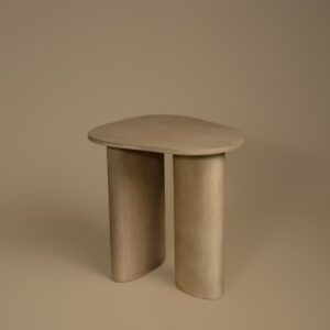 Sutton Lamp Table in solid mango wood, front three-quarter view showing the two oval legs