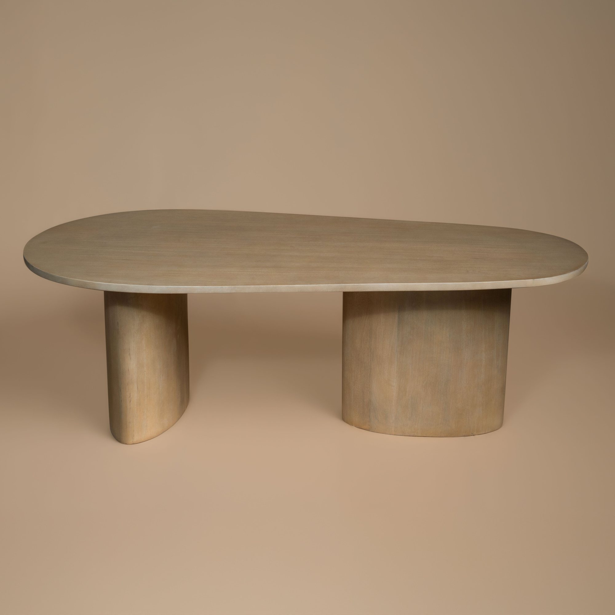 Sutton Coffee Table in solid mango wood with an organic rounded top
