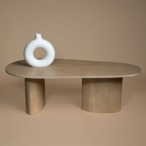 Sutton Coffee Table three-quarter view showing the wide oval legs