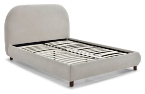 Nora Bed Frame in natural boucle styled in a bedroom