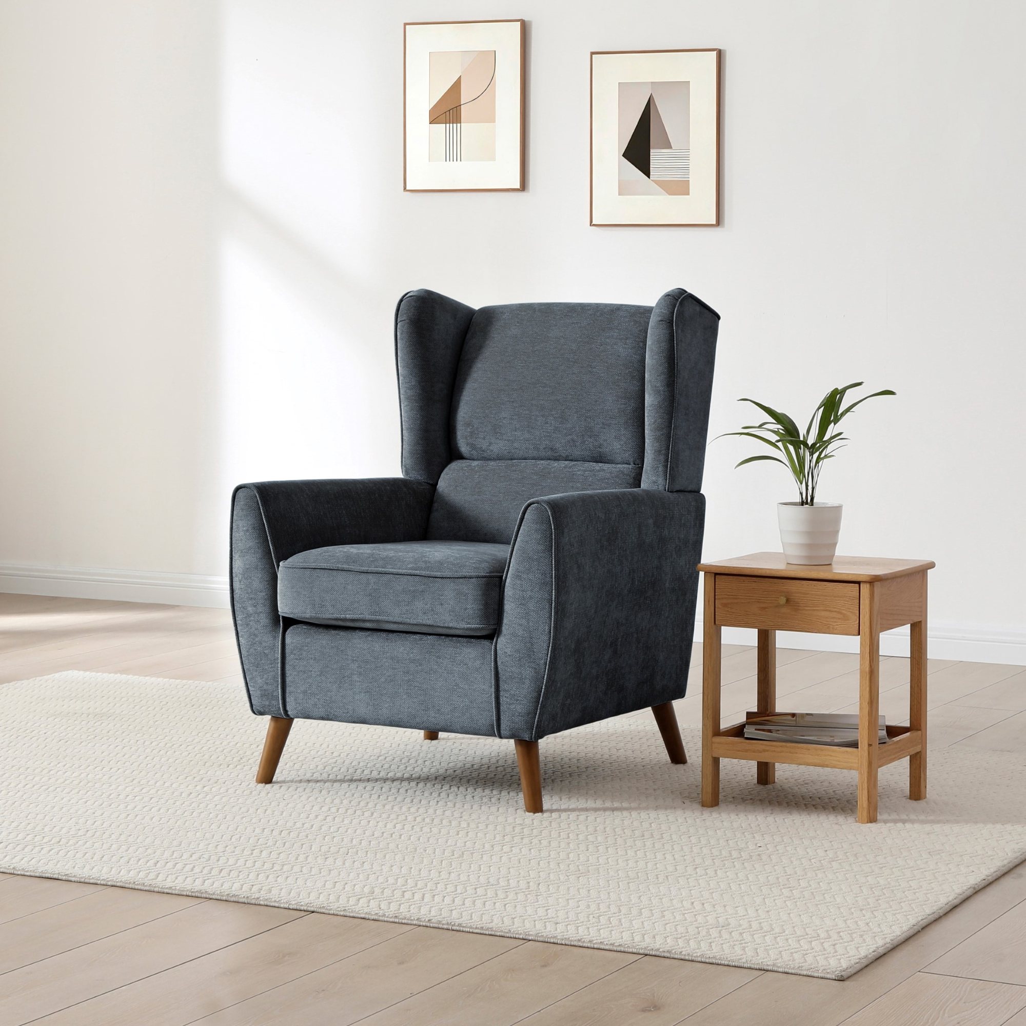 Pleated wing detail on the Luca armchair backrest