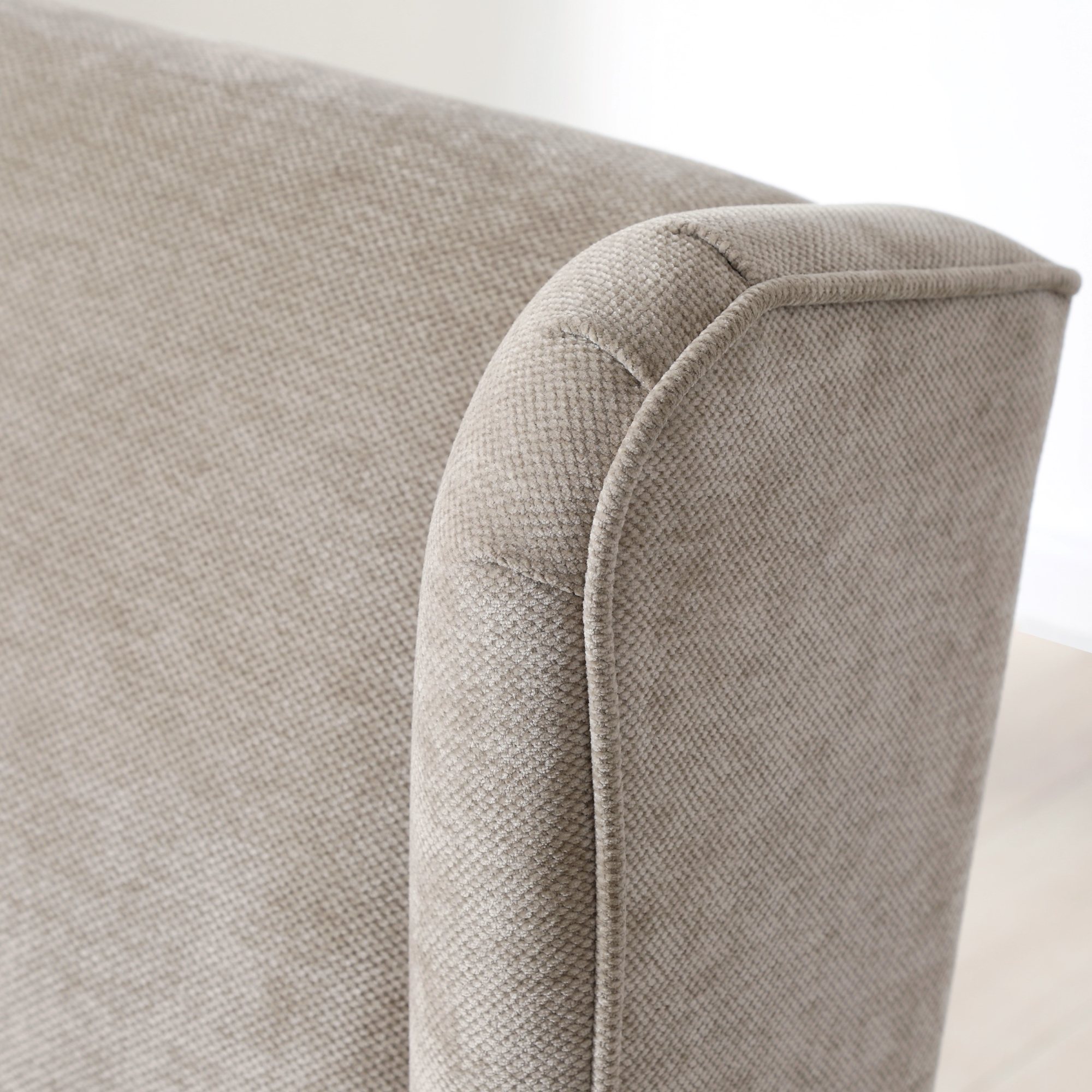 Chenille texture close-up on the Luca chair