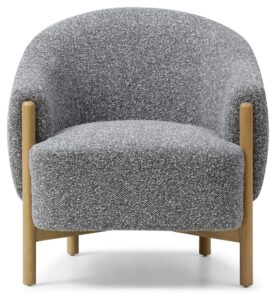 Suzie Barrel Armchair from the side showing the sloping arms