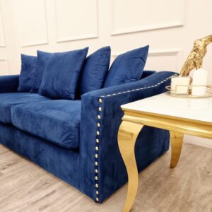 Lincoln sofa in marine blue velvet with scatter back cushions in a room setting