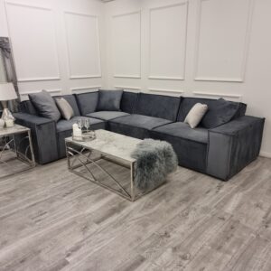 Midland velvet corner sofa seen from across a styled room