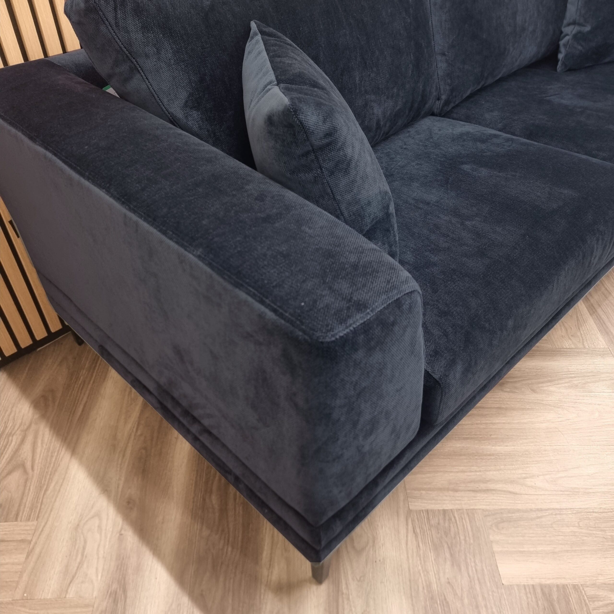 Close view of the Lenox sofa arm and velvet pile in aegean blue