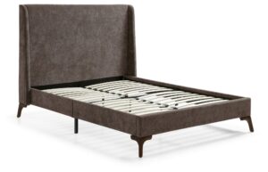 Denver bed frame upholstered in mocha herringbone chenille with a curved wing headboard and dark tapered wooden legs