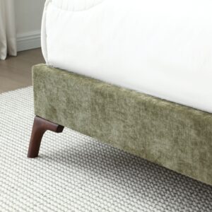 Foot end detail of the Denver upholstered bed in olive herringbone chenille showing the dark tapered wooden leg