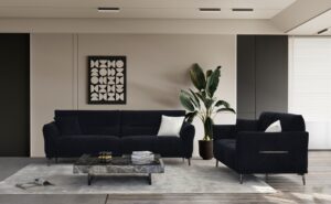 Albany black lux boucle sofa and armchair styled in a modern living room with marble coffee table