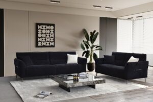 Albany black boucle three seater and chair seen across a styled living room