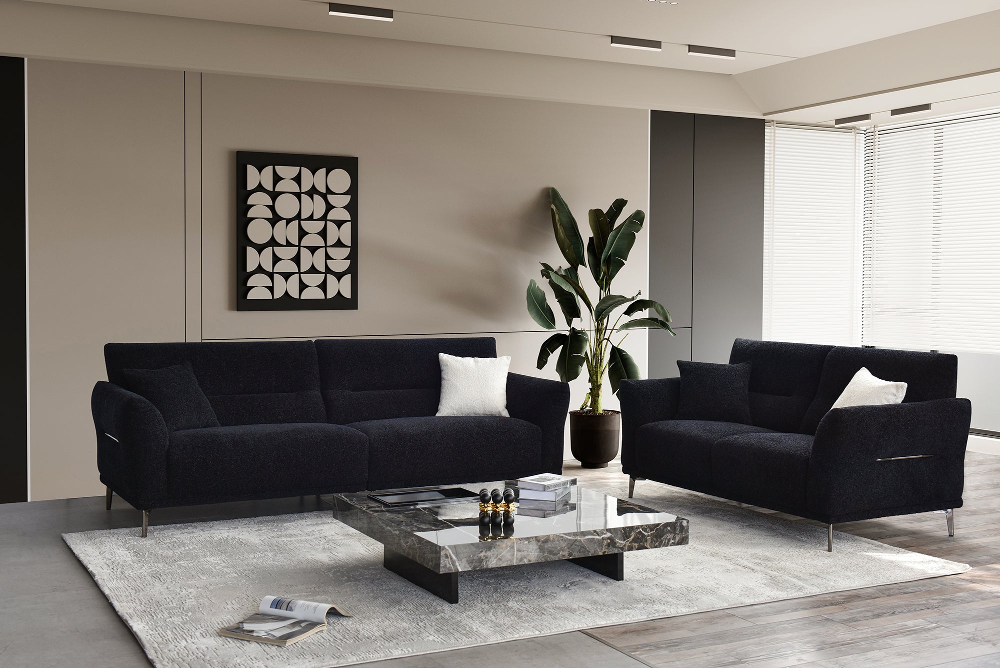 Albany black boucle three seater and chair seen across a styled living room