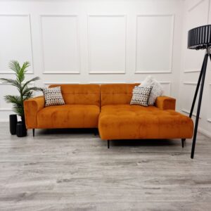 Oslo two piece cinema sofa in burnt orange in a styled room