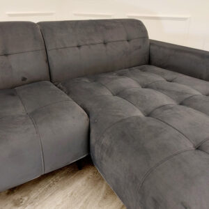 Close view of the Oslo steel grey upholstery and low padded back